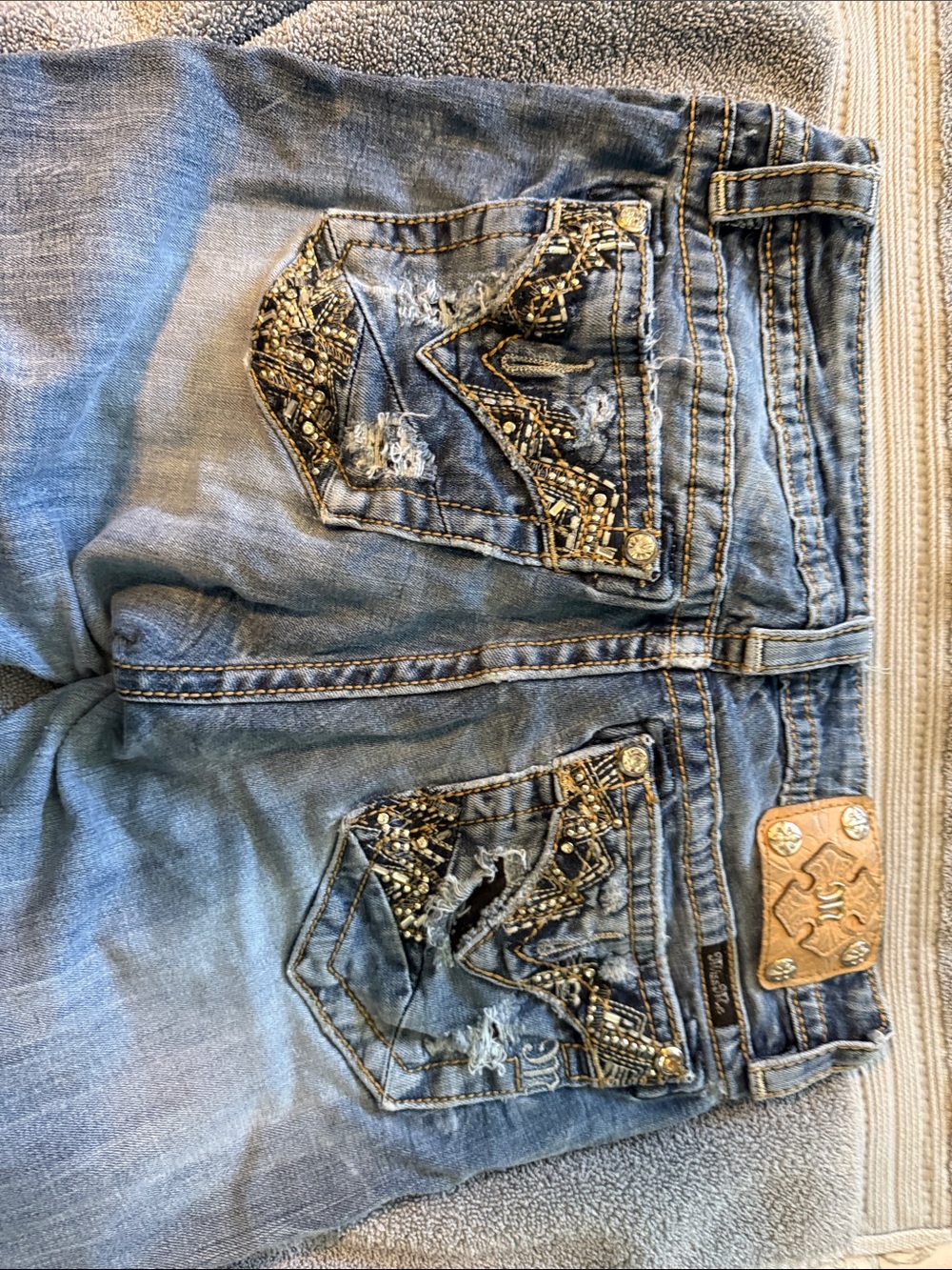 Miss Me Distressed Blue Boot Cut Jeans with Embellished Back Pockets